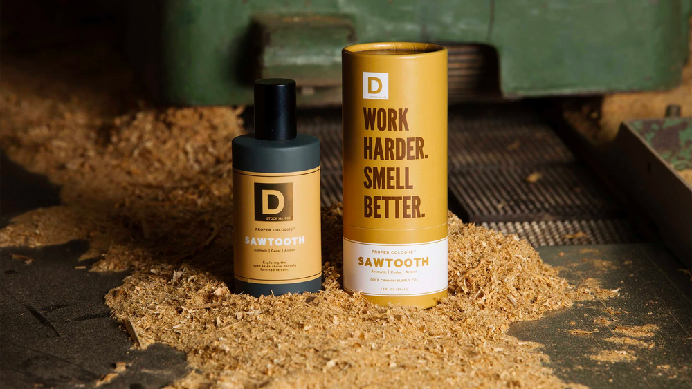 Duke Cannon's Sawtooth Proper Cologne on a table covered in sawtooth